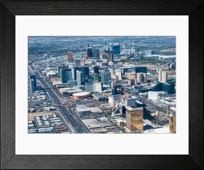 Framed Print : Las Vegas aerial view from aircraft. The Strip skyline and casinos on a summer day, Nevada, USA. All ads removed Framed Print : Las Vegas aerial view from aircraft. The Strip skyline and casinos on a summer day, Nevada, USA. All ads removed
