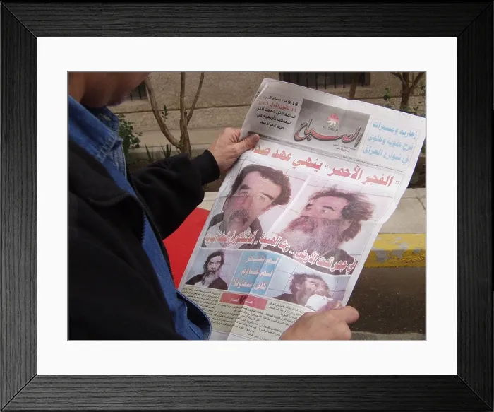 Framed Print : Newspaper in Iraq showing the capture of Saddam Hussein Framed Print : Newspaper in Iraq showing the capture of Saddam Hussein
