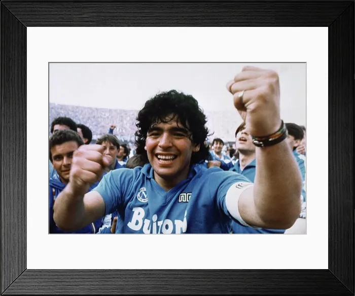 Framed Print : Argentine soccer superstar Diego Armando Maradona cheers after the Napoli team clinches its first Italian major league title in Naples Framed Print : Argentine soccer superstar Diego Armando Maradona cheers after the Napoli team clinches its first Italian major league title in Naples