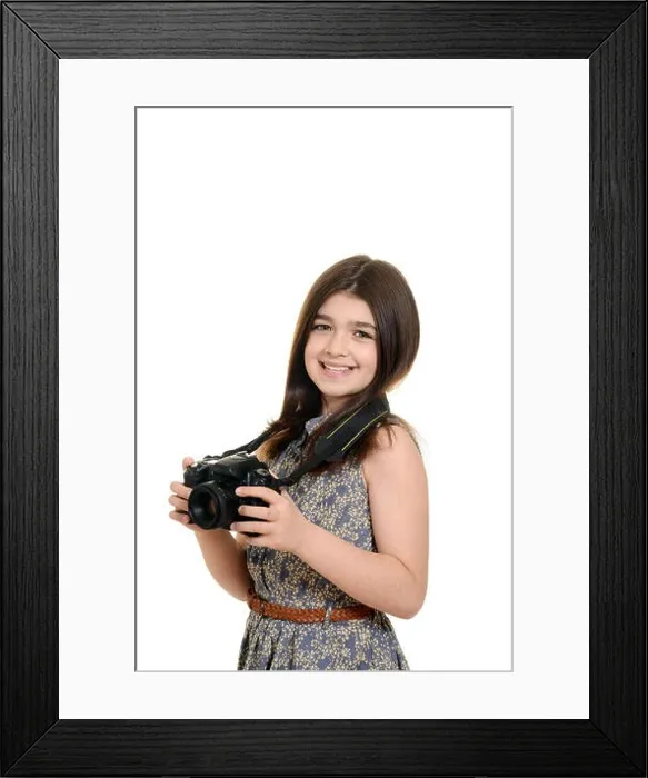 Framed Print : Little girl holding dslr camera Framed Print : Little girl holding dslr camera