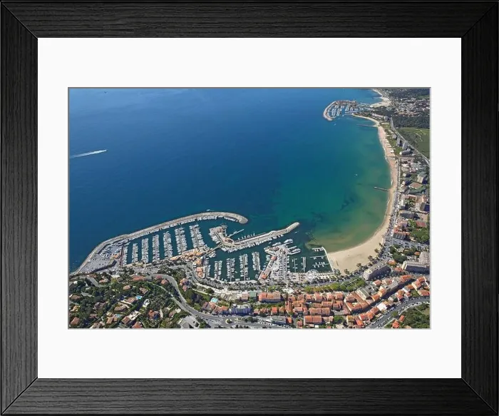 Framed Print : France, Var, Le Lavandou the coast its port and beach resort of international renown (aerial photo) Framed Print : France, Var, Le Lavandou the coast its port and beach resort of international renown (aerial photo)