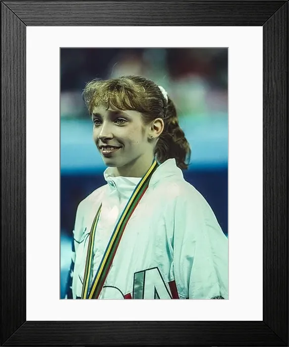 Framed Print : Kim Zmeskal (USA) competing in the women's artistic team all-around gymnastics at the 1992 Olympic Summer Games Framed Print : Kim Zmeskal (USA) competing in the women's artistic team all-around gymnastics at the 1992 Olympic Summer Games