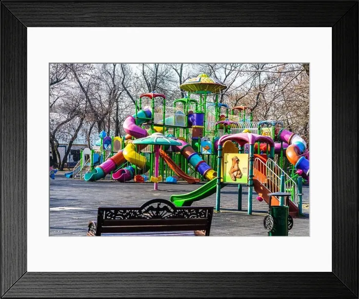 Framed Print : Outdoor colorful playground fun for children in Bucharest, Romania, 2021 Framed Print : Outdoor colorful playground fun for children in Bucharest, Romania, 2021