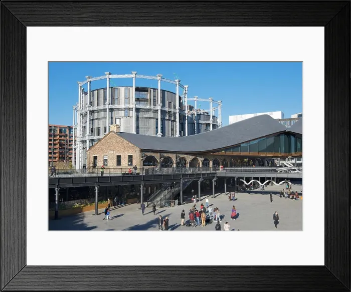 Framed Print : Coal Drops Yard modern development with converted luxury apartments from Victorian gas holders behind Kings Cross London England Framed Print : Coal Drops Yard modern development with converted luxury apartments from Victorian gas holders behind Kings Cross London England