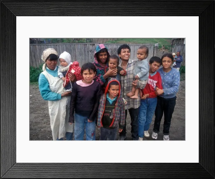 Framed Print : A large number of Gypsy children and adults spontaneously pose for a picture in the village of Soard, Romania Framed Print : A large number of Gypsy children and adults spontaneously pose for a picture in the village of Soard, Romania