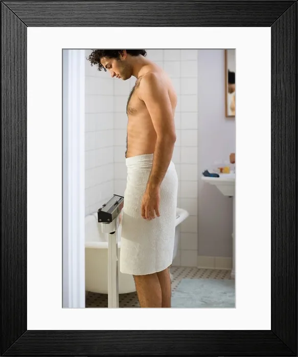 Framed Print : Young man wearing a towel Framed Print : Young man wearing a towel
