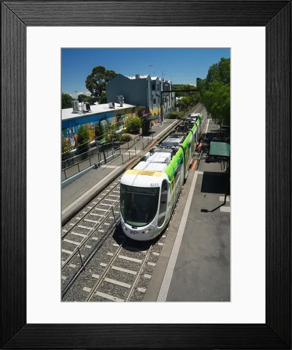 Framed Print : trams and tram stop on 86 line in south melbourne Framed Print : trams and tram stop on 86 line in south melbourne