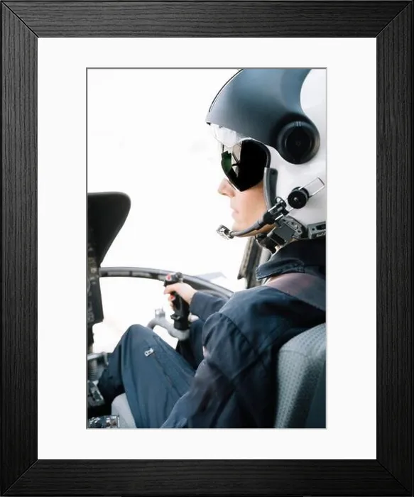 Framed Print : Attractive Woman pilot sitting in the helicopter Framed Print : Attractive Woman pilot sitting in the helicopter