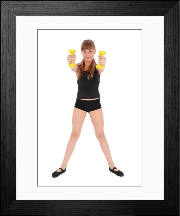 Framed Print : Gym fitness girl training her body with dumbbell on white background Framed Print : Gym fitness girl training her body with dumbbell on white background