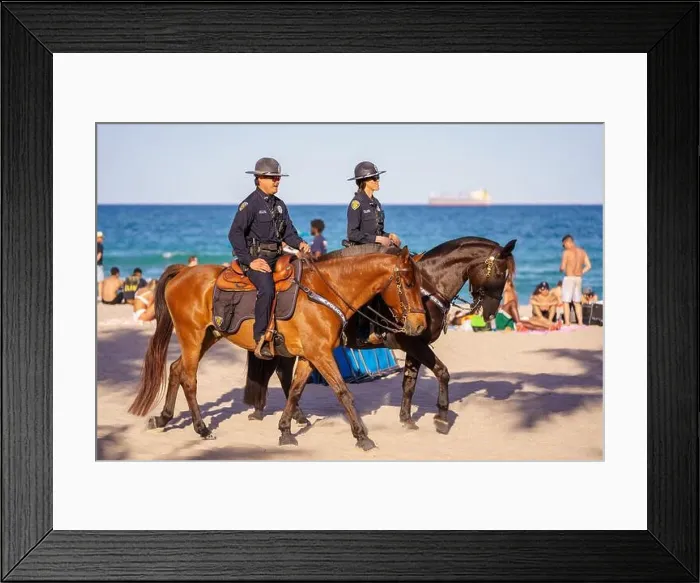 Framed Print : Fort Lauderdale, FL, USA - March 27, 2022: Police on horses on patrol in Fort Lauderdale Beach Spring Break Framed Print : Fort Lauderdale, FL, USA - March 27, 2022: Police on horses on patrol in Fort Lauderdale Beach Spring Break