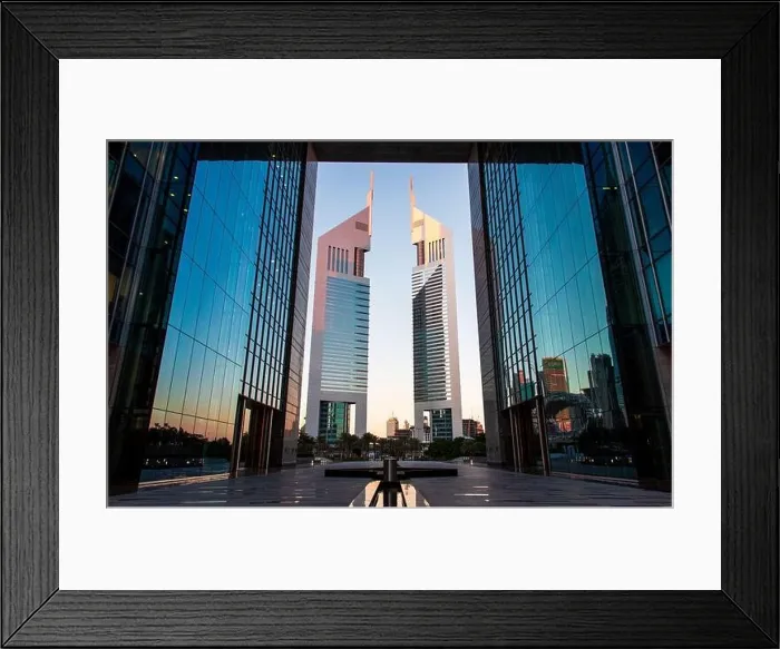 Framed Print : Dubai, United Arab Emirates - February 14, 2020: The Dubai International Financial Centre DIFC and Emirates towers in downtown Dubai UAE Framed Print : Dubai, United Arab Emirates - February 14, 2020: The Dubai International Financial Centre DIFC and Emirates towers in downtown Dubai UAE