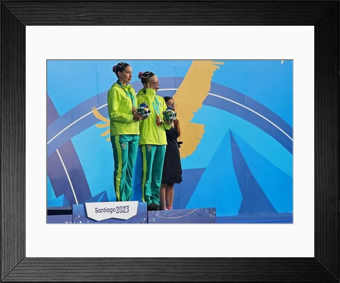 Framed Print : Santiago, Chile. 02nd Nov, 2023. Bronze medalist Laura Miccuci and Gabriela Regly of Brazil celebrates after the women's duets free routine final Framed Print : Santiago, Chile. 02nd Nov, 2023. Bronze medalist Laura Miccuci and Gabriela Regly of Brazil celebrates after the women's duets free routine final