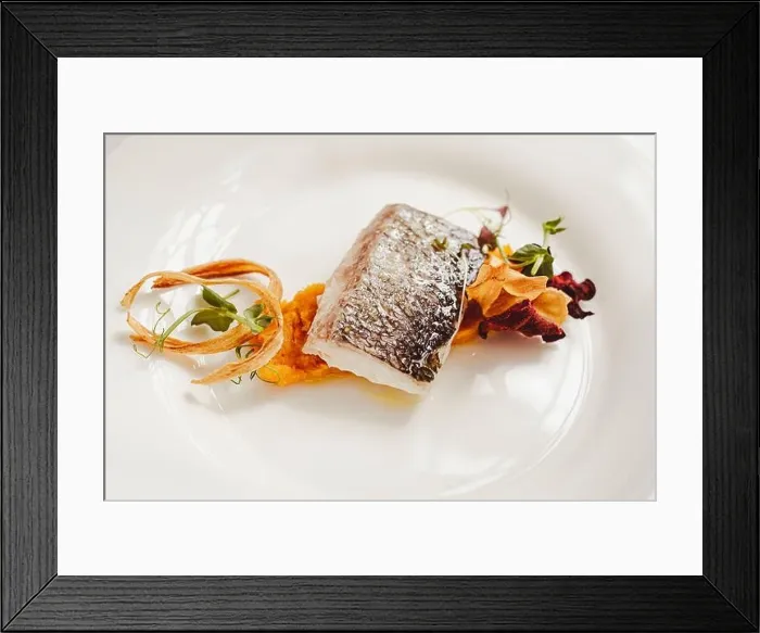 Framed Print : The Sea Bass is a typical main course on the italian tables. Here's a gourmet plating Framed Print : The Sea Bass is a typical main course on the italian tables. Here's a gourmet plating
