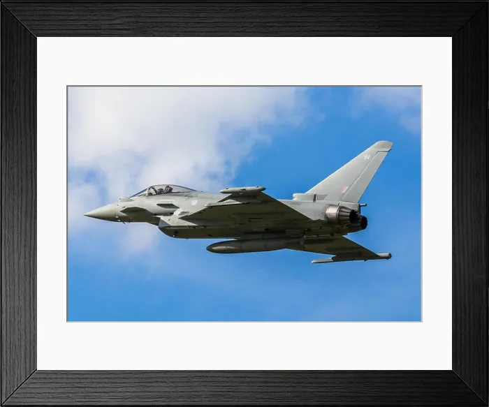 Framed Print : The RAF Typhoon performs a low flyover at Liverpool airport prior to landing Framed Print : The RAF Typhoon performs a low flyover at Liverpool airport prior to landing