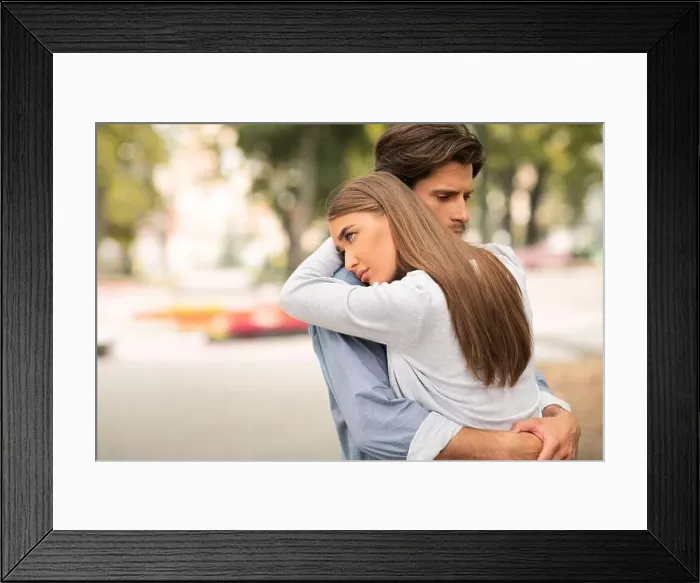 Framed Print : Sad Guy And Girl Hugging Feeling Unloved Standing Outdoors Framed Print : Sad Guy And Girl Hugging Feeling Unloved Standing Outdoors