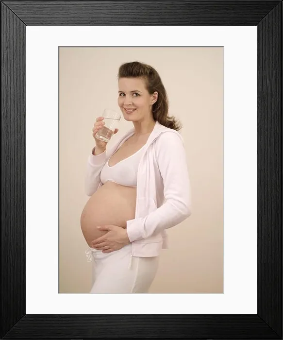Framed Print : Woman, pregnant, bare midriff, water glass, smile, drink detail, Gestation, gestation, 25 - 35 years, pregnant, gestation, baby abdomen, glass