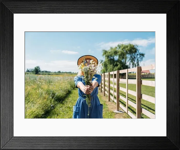 Framed Print : Agritourism and Farm Tours, Farm Cottagecore Weekend Trip. Farm Trips For Peaceful Weekend. A woman in rustic dress and with wildflowers in front of Framed Print : Agritourism and Farm Tours, Farm Cottagecore Weekend Trip. Farm Trips For Peaceful Weekend. A woman in rustic dress and with wildflowers in front of