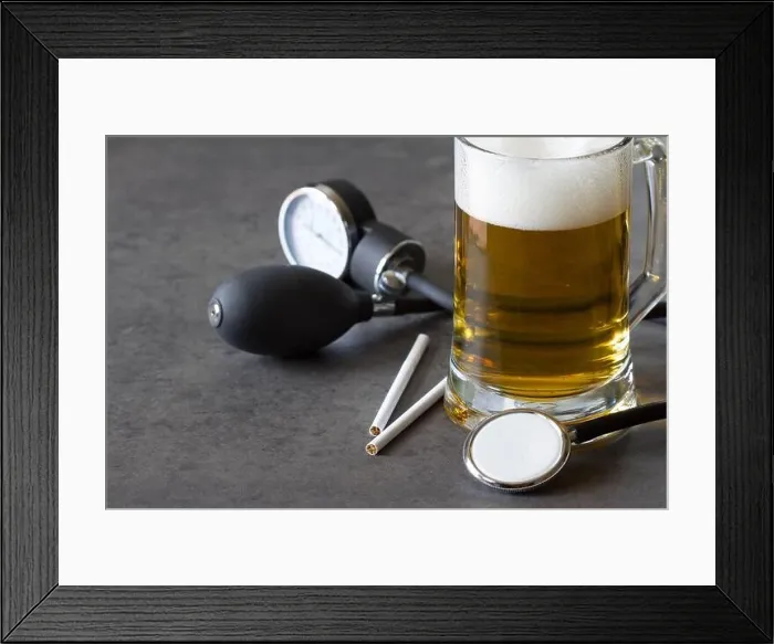 Framed Print : Glass of beer, cigarettes and blood pressure monitor, alcohol abuse, nicotine, hypertension concept Framed Print : Glass of beer, cigarettes and blood pressure monitor, alcohol abuse, nicotine, hypertension concept