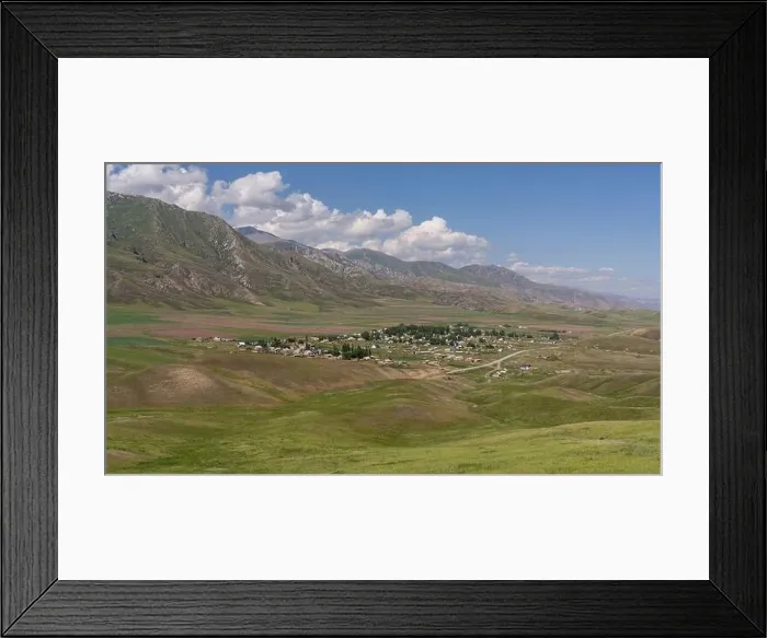 Framed Print : Dyudyumel, Kyrgyzstan - July 4, 2019: the small village of Dyudyumel in a valley with mountains in the background Framed Print : Dyudyumel, Kyrgyzstan - July 4, 2019: the small village of Dyudyumel in a valley with mountains in the background