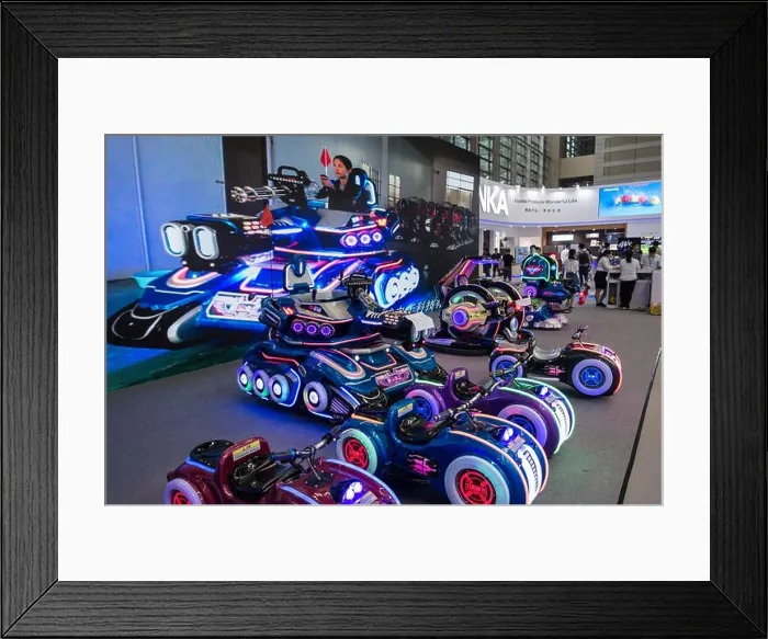 Framed Print : Ride-on kids cars and vehicles display for sale Framed Print : Ride-on kids cars and vehicles display for sale