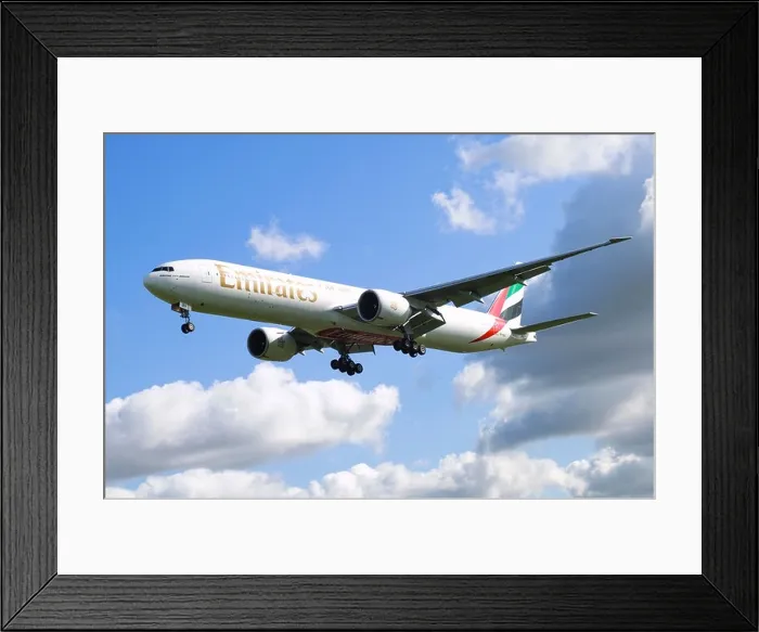 Framed Print : Boeing 777 operated by Emirates on approach for landing at Birmingham Airport, UK Framed Print : Boeing 777 operated by Emirates on approach for landing at Birmingham Airport, UK
