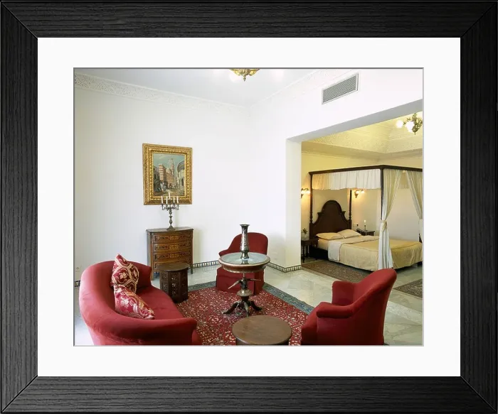 Framed Print : View of a living room with an attached bedroom Framed Print : View of a living room with an attached bedroom