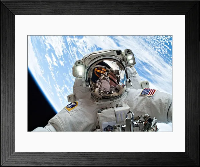 Framed Print : NASA astronaut Mike Hopkins takes a selfie with the Earth as background as he takes part in a spacewalks to change out a faulty water pump Framed Print : NASA astronaut Mike Hopkins takes a selfie with the Earth as background as he takes part in a spacewalks to change out a faulty water pump