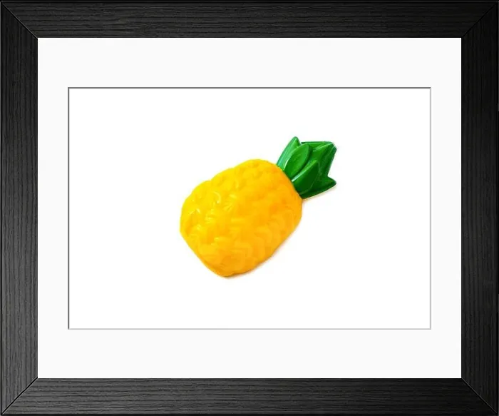 Framed Print : Pineapple. Toy plastic fruit isolated on white background. Plastic fruit for the game. Playing at the kids store Framed Print : Pineapple. Toy plastic fruit isolated on white background. Plastic fruit for the game. Playing at the kids store