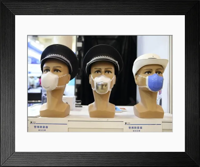 Framed Print : Police anti-smog face masks are on display during the 6th China (Beijing) International Exhibition and Symposium on Police Equipment Anti-Terrorism Te Framed Print : Police anti-smog face masks are on display during the 6th China (Beijing) International Exhibition and Symposium on Police Equipment Anti-Terrorism Te