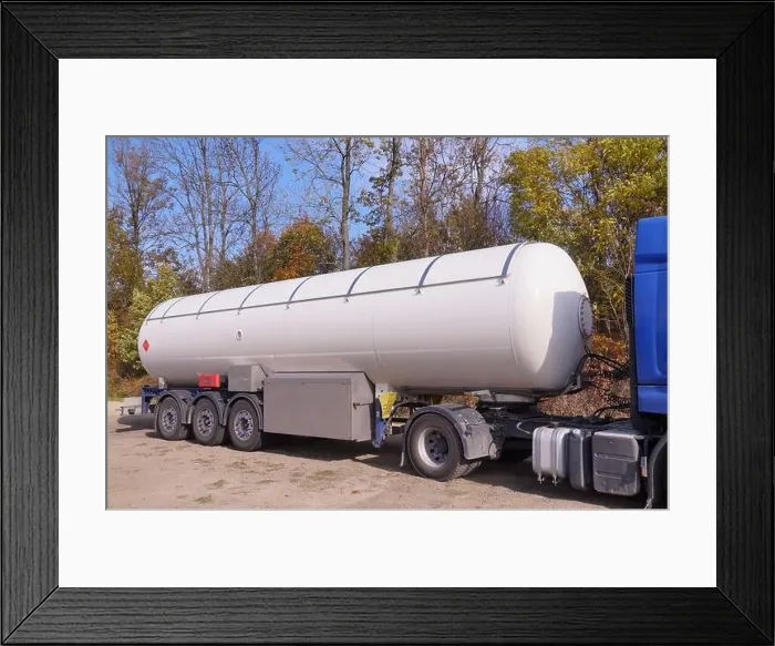 Framed Print : Truck with a specialist semi-trailer. Road tanker with thermal insulation designed for the carriage flammable substances Framed Print : Truck with a specialist semi-trailer. Road tanker with thermal insulation designed for the carriage flammable substances
