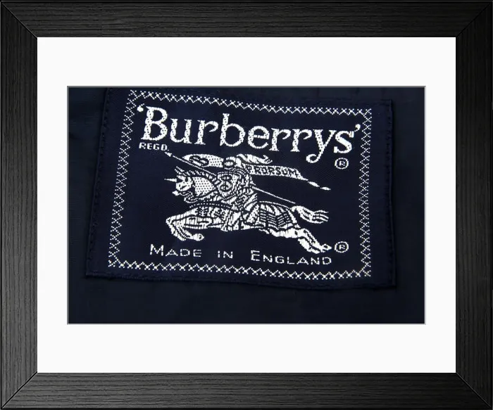 Framed Print : Burberry's Label On Black Jacket Framed Print : Burberry's Label On Black Jacket