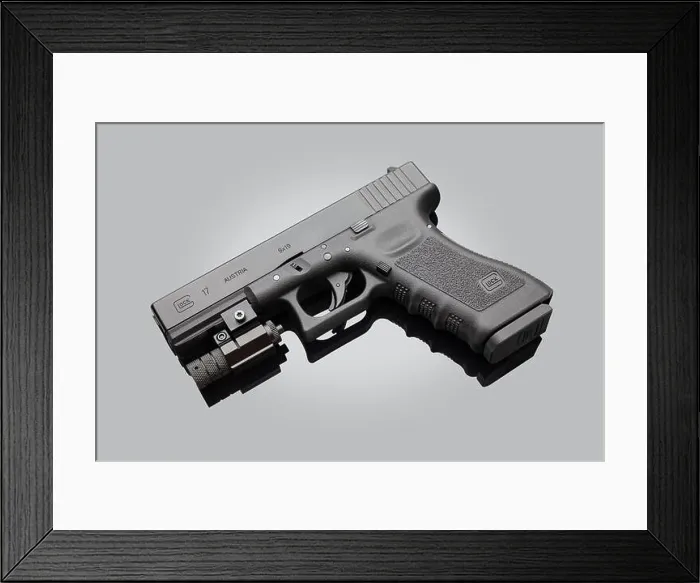 Framed Print : Glock 17 9mm (Gen 3) Pistol with Lasersight Framed Print : Glock 17 9mm (Gen 3) Pistol with Lasersight