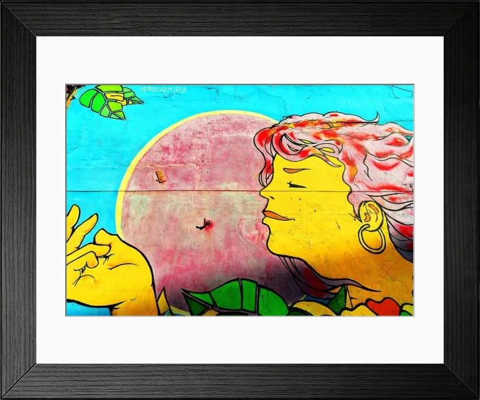 Framed Print : Spain Cartagena Banksy type wall painting of girl blue yellow red Framed Print : Spain Cartagena Banksy type wall painting of girl blue yellow red