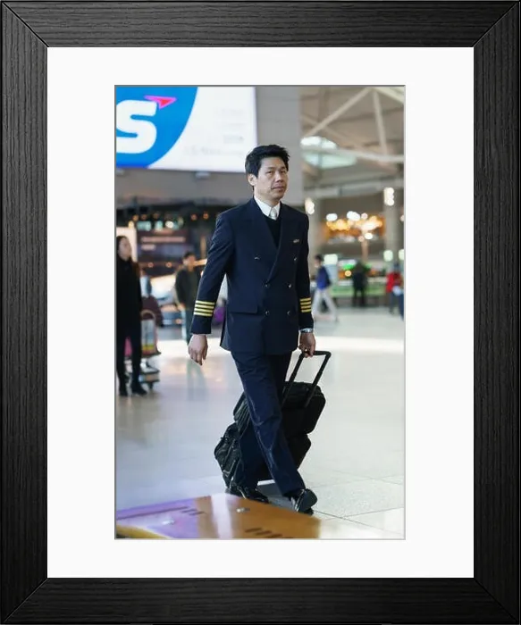 Framed Print : Incheon, South Korea - February 15, 2016: Asian Korean male flight attendant in the Incheon international airport Framed Print : Incheon, South Korea - February 15, 2016: Asian Korean male flight attendant in the Incheon international airport