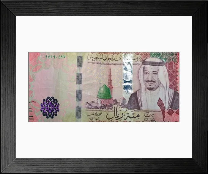 Framed Print : Saudi Arabia 100 riyal banknote, The Saudi riyal is the currency of Saudi Arabia, selective focus of Saudi kingdom cash money Framed Print : Saudi Arabia 100 riyal banknote, The Saudi riyal is the currency of Saudi Arabia, selective focus of Saudi kingdom cash money