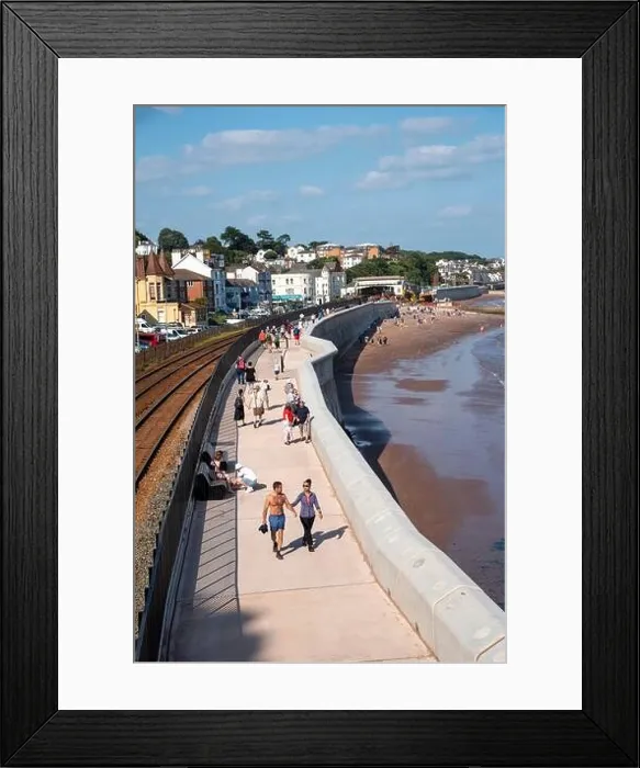Framed Print : Dawlish, Devon, England, UK. 2021. An overview of a section of the new sea wall and railway line at Dawlish a coastal resort in Devon, UK Framed Print : Dawlish, Devon, England, UK. 2021. An overview of a section of the new sea wall and railway line at Dawlish a coastal resort in Devon, UK