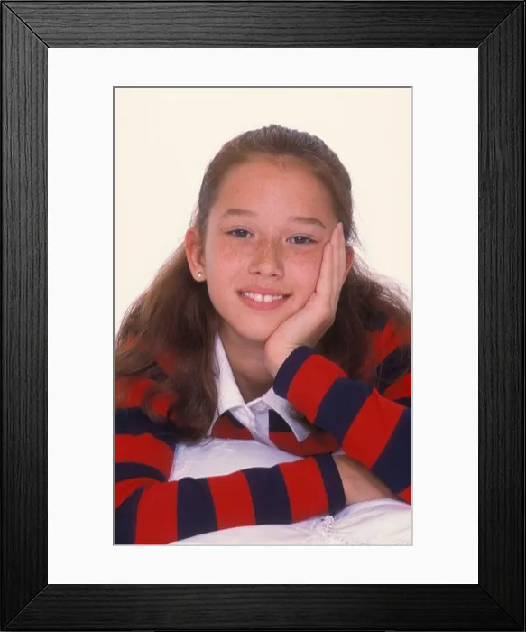 Framed Print : Young girl 10 years old with attitude Framed Print : Young girl 10 years old with attitude