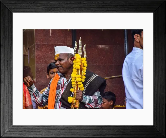 Framed Print : A closeup of an Indian priest, wearing casual clothes, saffron color scarf white cap Framed Print : A closeup of an Indian priest, wearing casual clothes, saffron color scarf white cap