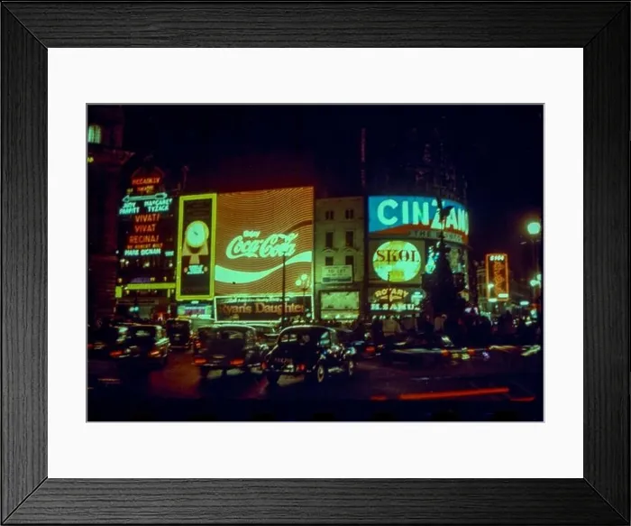 Framed Print : The neon lights of London's Piccadilly Circus at night in 1970 Framed Print : The neon lights of London's Piccadilly Circus at night in 1970