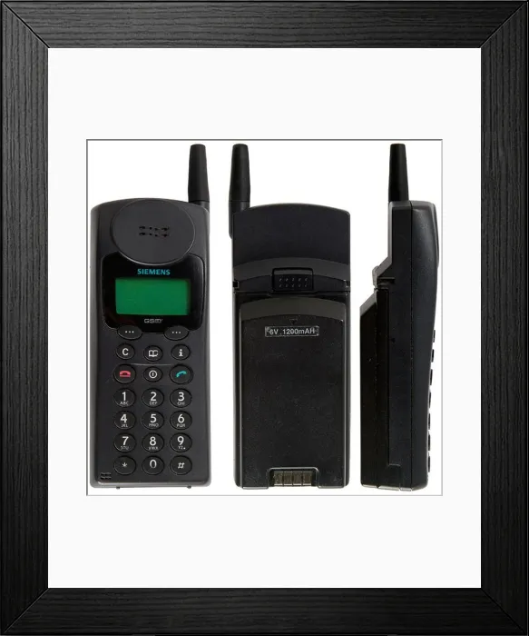 Framed Print : Front, back and side view of a big, heavy, old Siemens gsm mobile phone on white background Framed Print : Front, back and side view of a big, heavy, old Siemens gsm mobile phone on white background