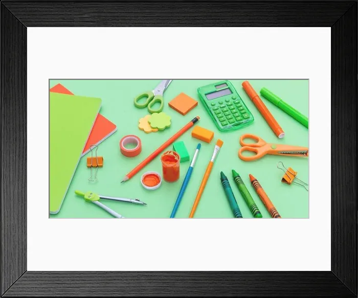 Framed Print : School supplies background. Stationery on green color, high angle view. Education, Back to School, kids creativity concept Framed Print : School supplies background. Stationery on green color, high angle view. Education, Back to School, kids creativity concept