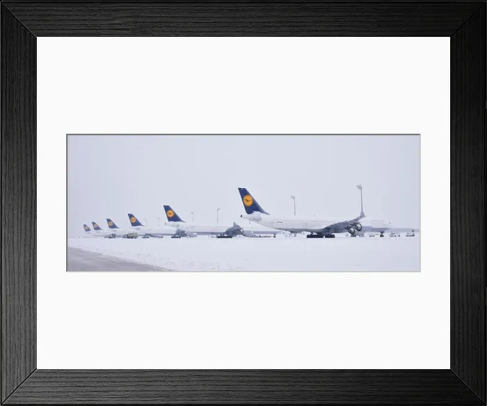 Framed Print : Lufthansa aircrafts in parking position in the snow Framed Print : Lufthansa aircrafts in parking position in the snow