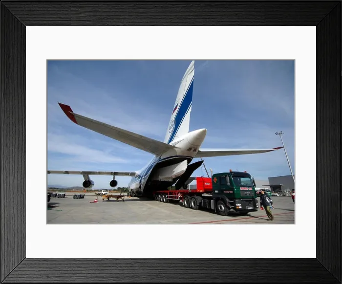 Framed Print : Rear cargo doors open for unloading at Valencia Airport, Spain. Volga-Dnepr Airlines, Antonov An-124-100 Framed Print : Rear cargo doors open for unloading at Valencia Airport, Spain. Volga-Dnepr Airlines, Antonov An-124-100