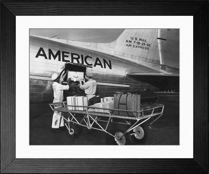 Framed Print : United States: c. 1946 Baggage handlers loading luggage onto an American Airlines DC-3, the FLagship Detroit Framed Print : United States: c. 1946 Baggage handlers loading luggage onto an American Airlines DC-3, the FLagship Detroit