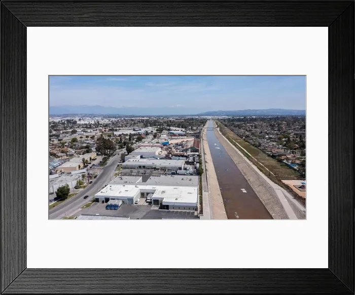Framed Print : Aerial view of the Rio Hondo River as it flows through Downey and Bell Gardens, California, USA Framed Print : Aerial view of the Rio Hondo River as it flows through Downey and Bell Gardens, California, USA