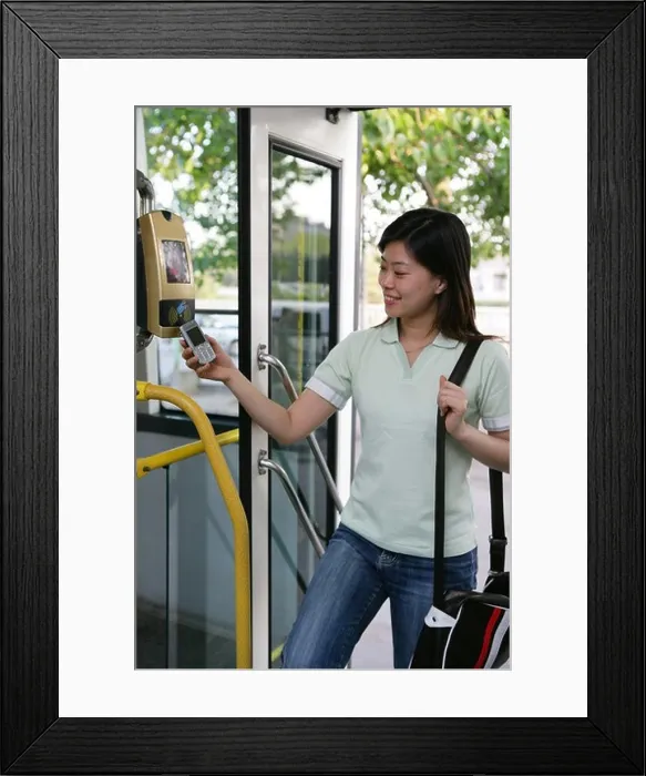 Framed Print : a chinese young woman taking a bus Framed Print : a chinese young woman taking a bus