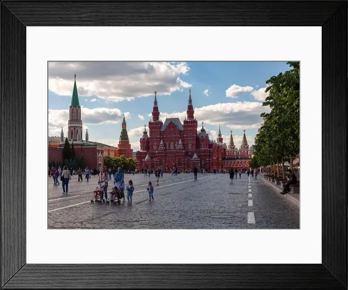 Framed Print : MOSCOW, RUSSIA - JUNE 01, 2021: Tourists walk on Red Square near the Kremlin Framed Print : MOSCOW, RUSSIA - JUNE 01, 2021: Tourists walk on Red Square near the Kremlin
