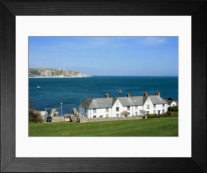 Framed Print : View towards cottages at Peveril Point on a sunny day, Swanage Bay, Dorset, UK Framed Print : View towards cottages at Peveril Point on a sunny day, Swanage Bay, Dorset, UK