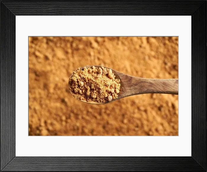 Framed Print : A spoonful of panela or rapadura - healthy sweetener made by evaporating sugercane juice, top view Framed Print : A spoonful of panela or rapadura - healthy sweetener made by evaporating sugercane juice, top view
