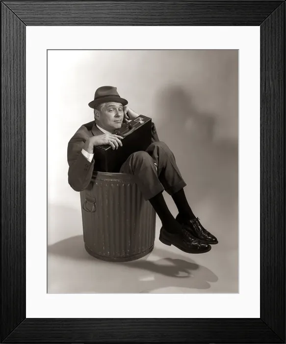 Framed Print : 1960s SYMBOLIC BUSINESSMAN IN SUIT & HAT HOLDING BRIEFCASE DUMPED FIRED MADE REDUNDANT LAID OFF UNEMPLOYED SITTING IN Framed Print : 1960s SYMBOLIC BUSINESSMAN IN SUIT & HAT HOLDING BRIEFCASE DUMPED FIRED MADE REDUNDANT LAID OFF UNEMPLOYED SITTING IN